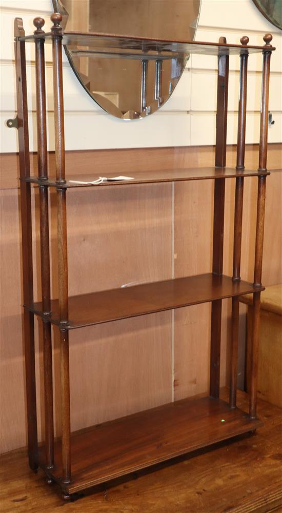 A Regency mahogany four tier wall shelf W.62cm